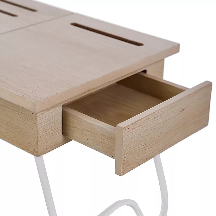 Image of wooden lap desk on metal legs with side drawer and storage. Links to Bed Bath and Beyond website.