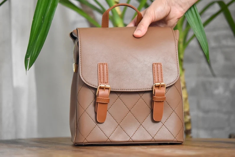 Image of vegan leather backpack, with link to Etsy seller